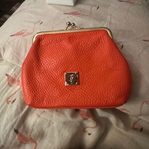 Orange Clutch with Textured Leather and Metal Frame Closure